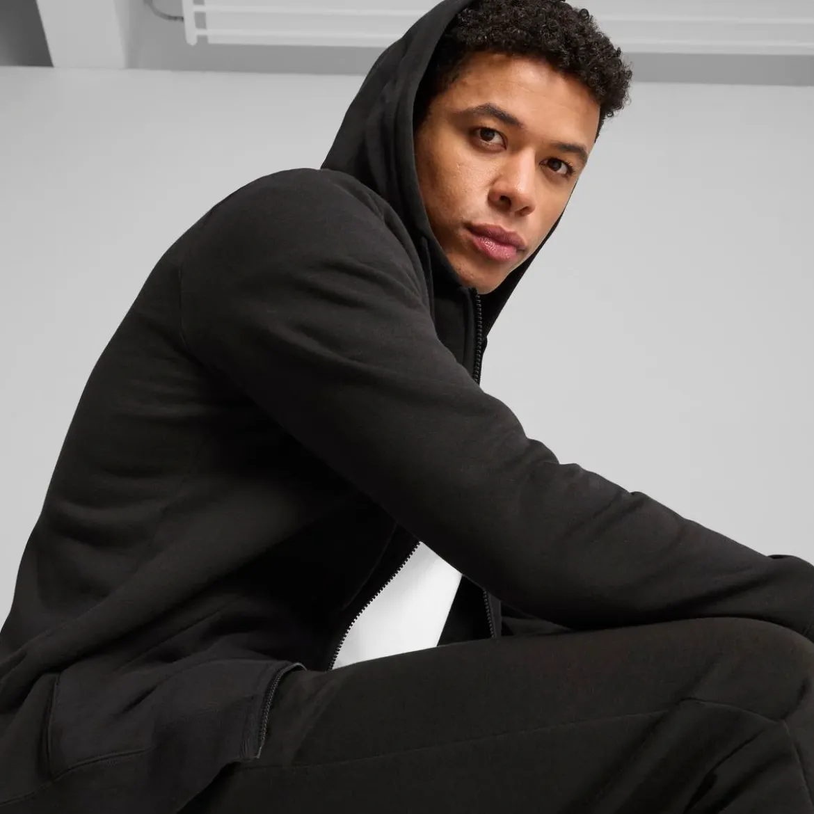 Felpa Full Zip da uomo nera Puma Essentials con cappuccio