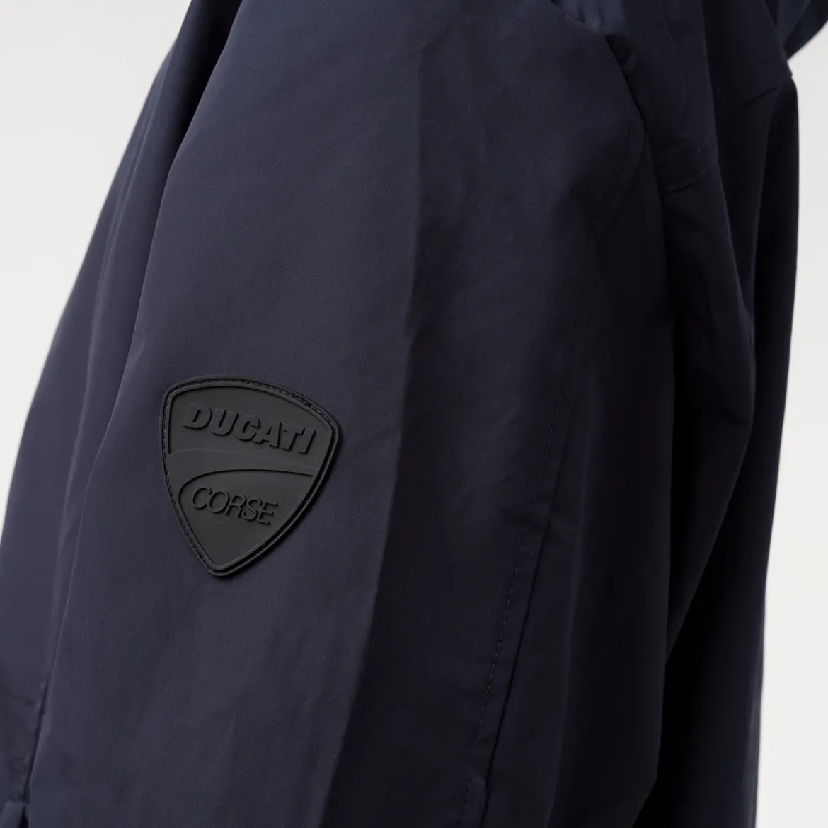 Giacca a vento da uomo blu con tasche e cappuccio rimovibile Ducati Corse