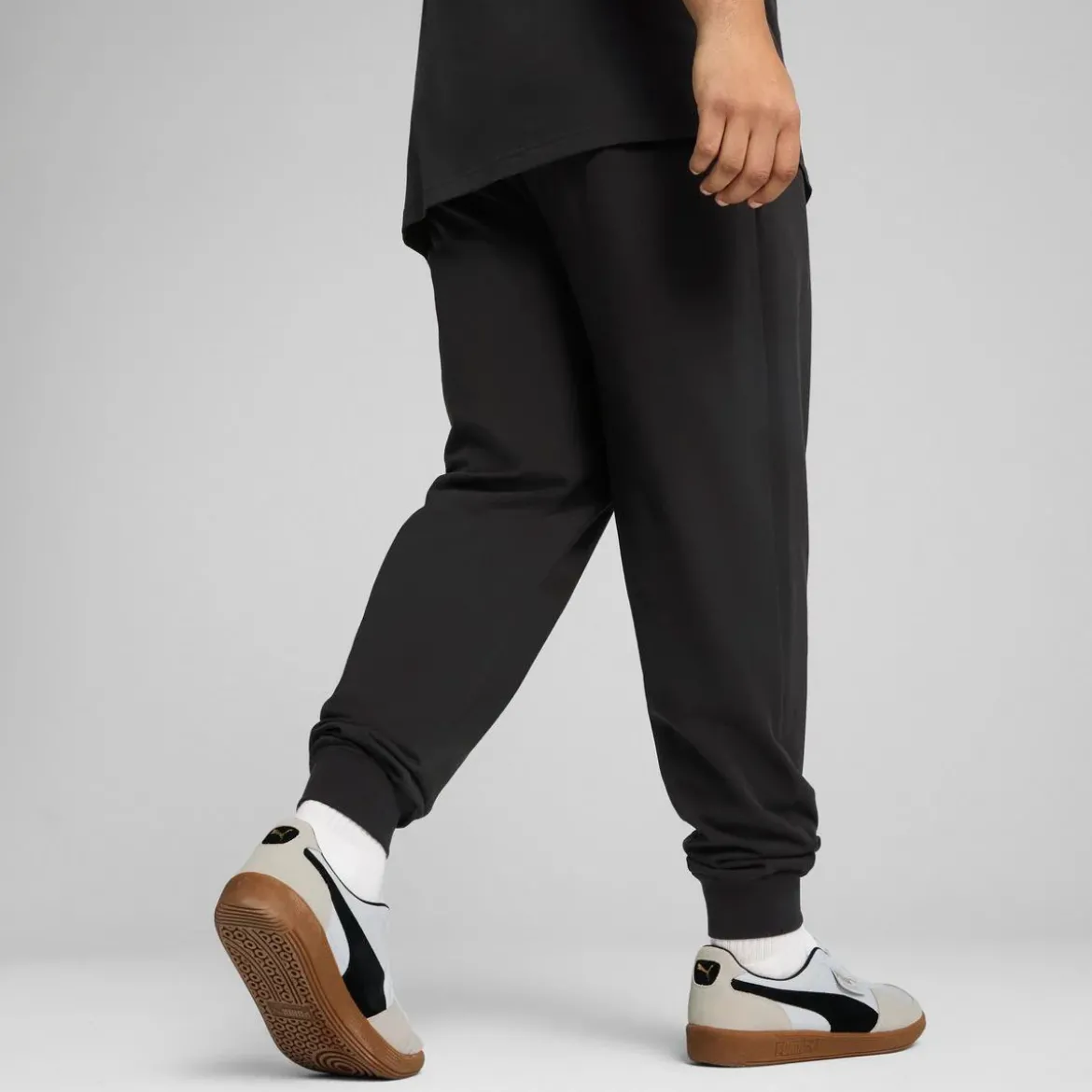 Pantaloni sportivi da uomo neri Puma con logo e polsini alle caviglie