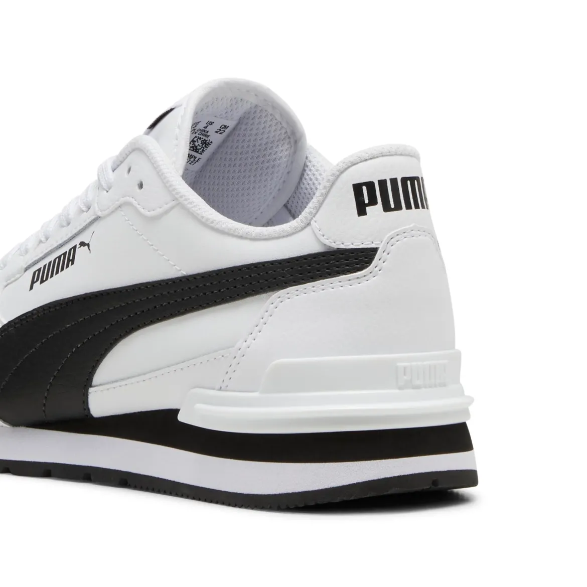 Sneakers bianche e nere da ragazzo e ragazza con logo Puma Runner v4
