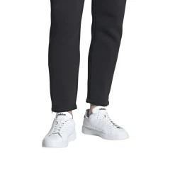 Sneakers bianche Unisex con dettagli logo traforati laterali adidas